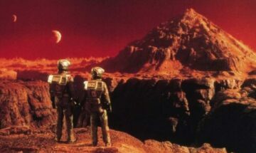 Douglas Quaid et Melina face au grand canyon de Mars et à sa montagne pyramidale, dans le rêve initial de Total Recall.